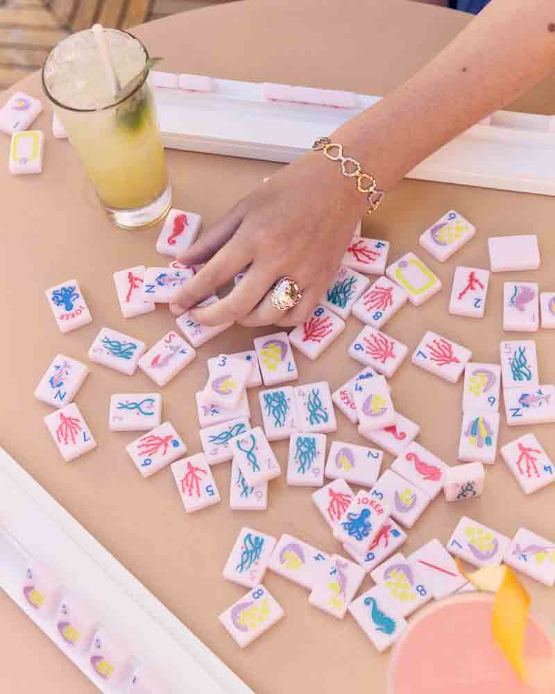Woman playing mahjong