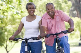 Healthy Couple Riding Bikes