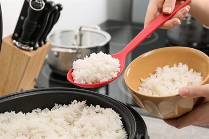 Athlete Adding Rice to a Bowl