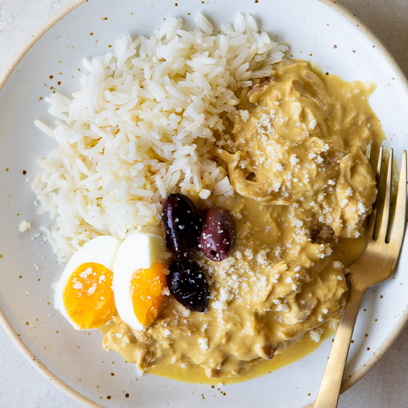 Close up view of a serving of Aji de Gallina.