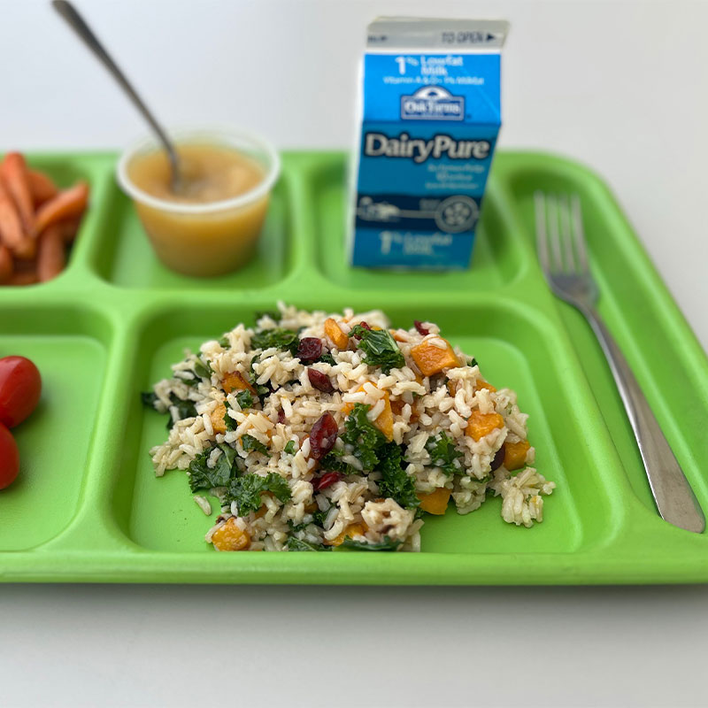 A serving of Autumn Rice on a cafeteria tray.