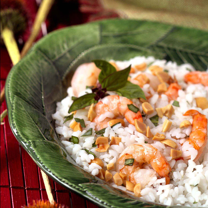Bangkok Rice & Shrimp-Salad Side view of Bangkok Rice and Shrimp Salad in a green bowl.