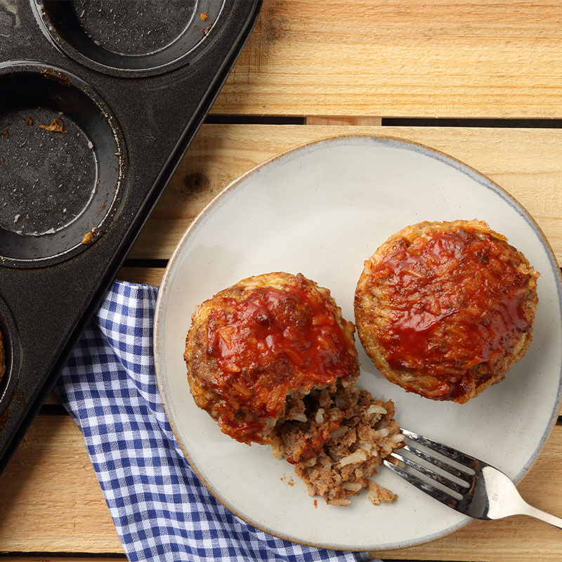 Two BBQ Muffin Rounds on a white plate.