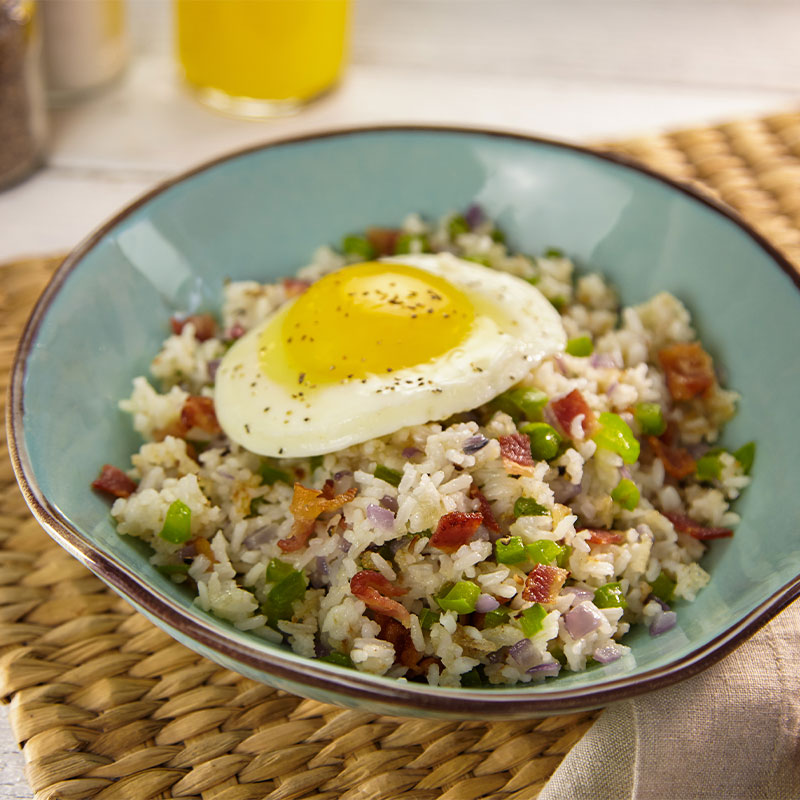 Breakfast Fried Rice Overhead shot of Breakfast Fried Rice with a fried egg on top.
