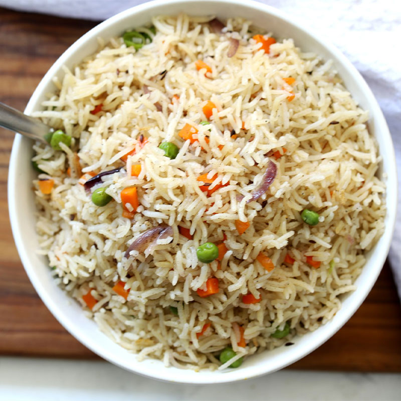 Overhead view of a bowl of Brown Butter Vegetable Pulao.