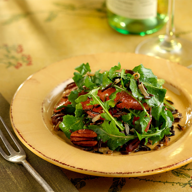 overhead shot of California Wild Rice, Arugula, Grapefruit, and Toasted Pecans