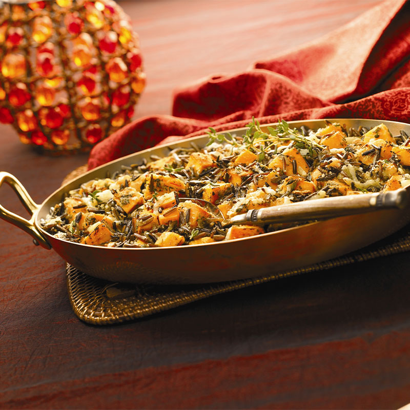 California Wild Rice and Pumpkin Gratin Side profile of California Wild-Rice and Pumpkin Gratin in a serving platter.