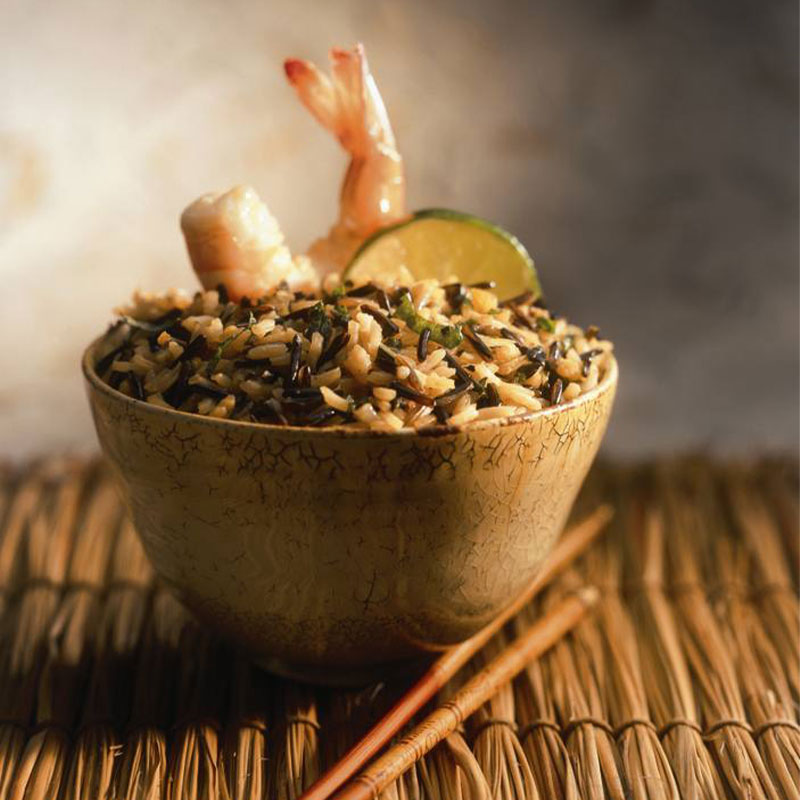 California Wild Rice Bangkok Side view of California Wild Rice Bangkok with a shrimp and slice of lime on top.