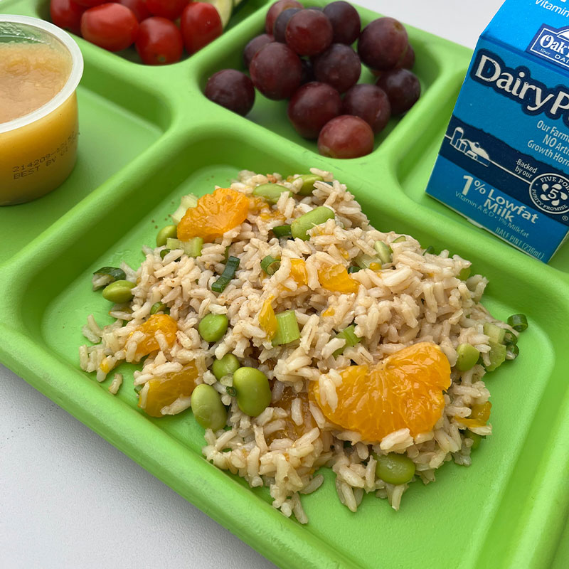 Citrus Rice Citrus Rice on a cafeteria tray.