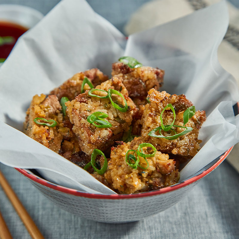 Overhead image of a basket of Crispy Fried Rice Cakes.