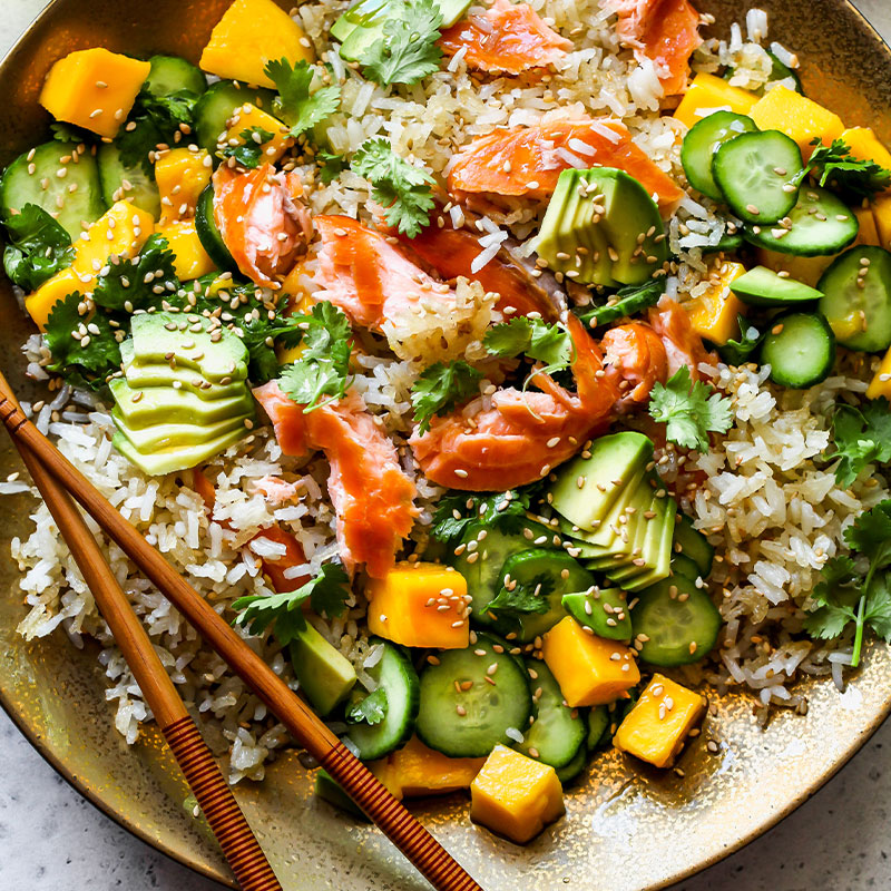 Zoomed in image of a bowl of Crispy Sesame Rice Salad.