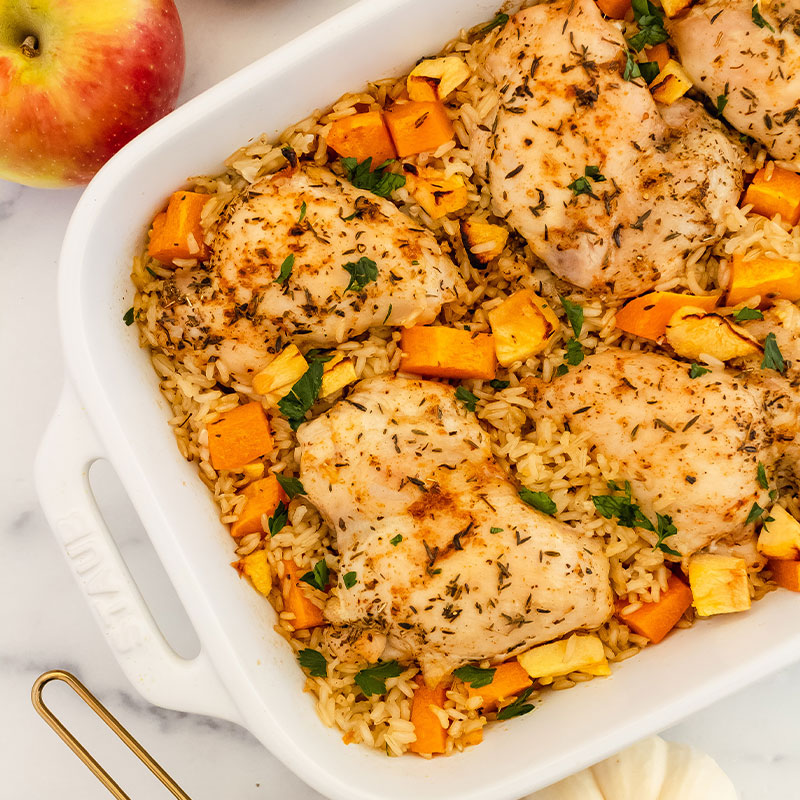 Overhead view of a colorful Fall Chicken & Rice Bake.