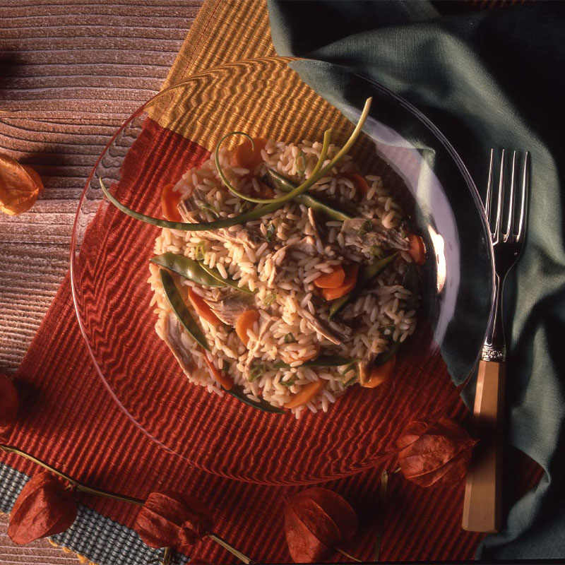 Overhead shot of Gingered Fried Rice on a translucent plate.