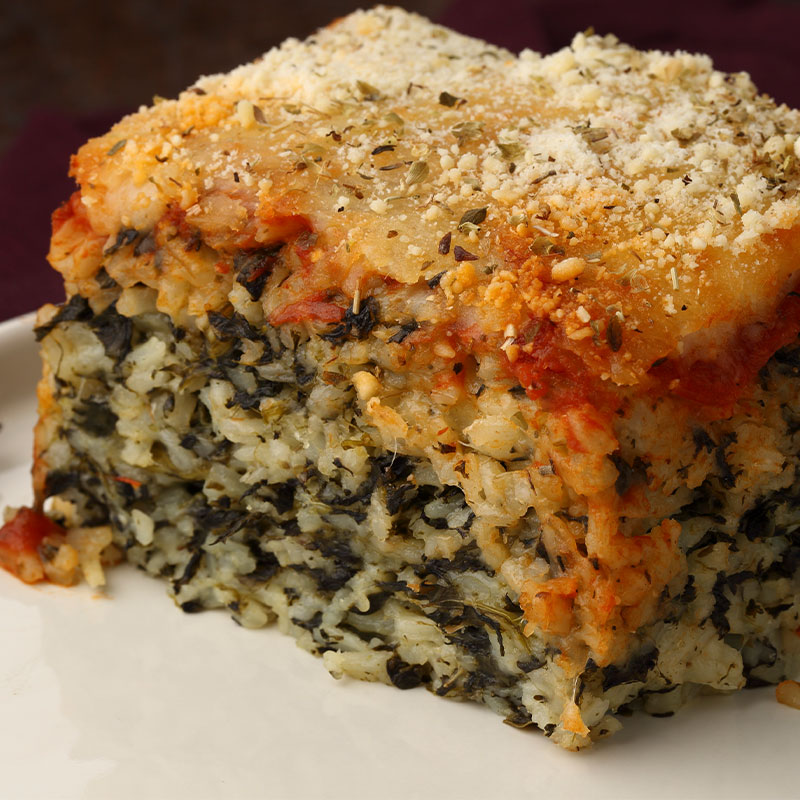 Italian Pepperoni Rice Side view of one serving square of Italian Pepperoni Rice.