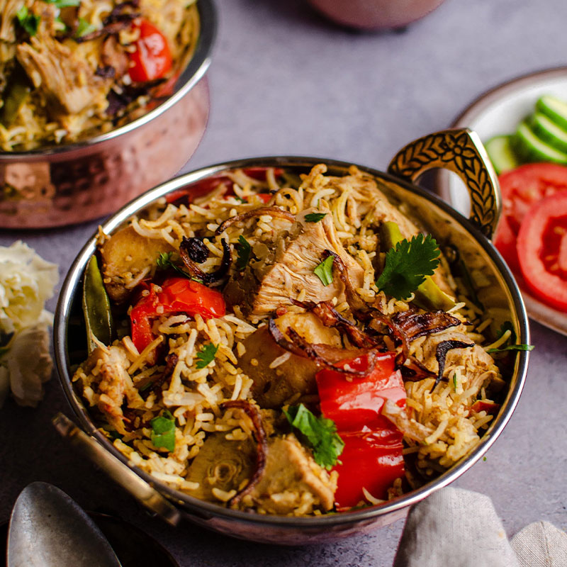 Side view of a bowl of Jackfruit Biryani.