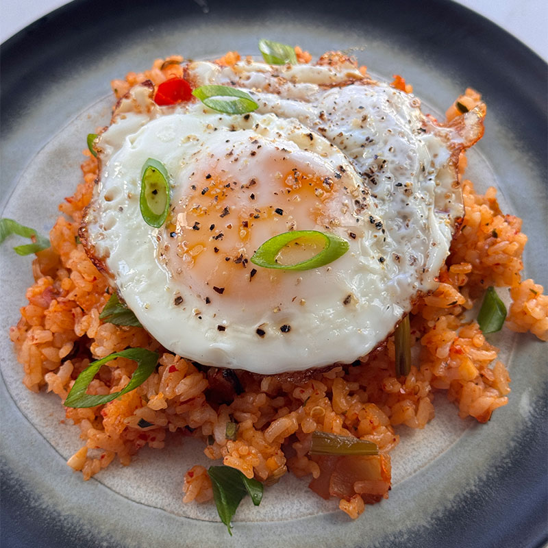 Kimchi Fried Rice A plated serving of Kimchi Fried Rice.