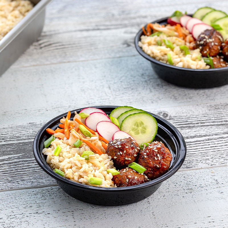 Overhead view of Korean Meatball Rice Bowl on a table.