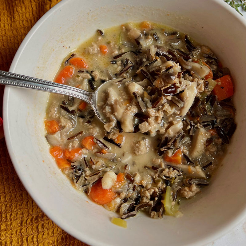 Overhead view of a bowl of Mushroom and Wild Rice Soup