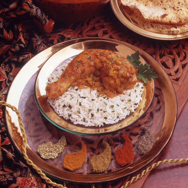 Overhead view of Pakistani Chicken on a bed of rice.