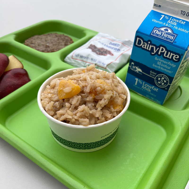 Peachy Breakfast Rice A serving of Peachy Breakfast Rice on a cafeteria tray.