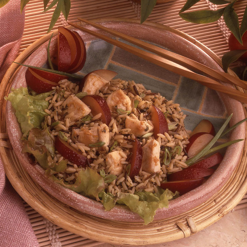 Overhead plum ginger rice salad on a plate.