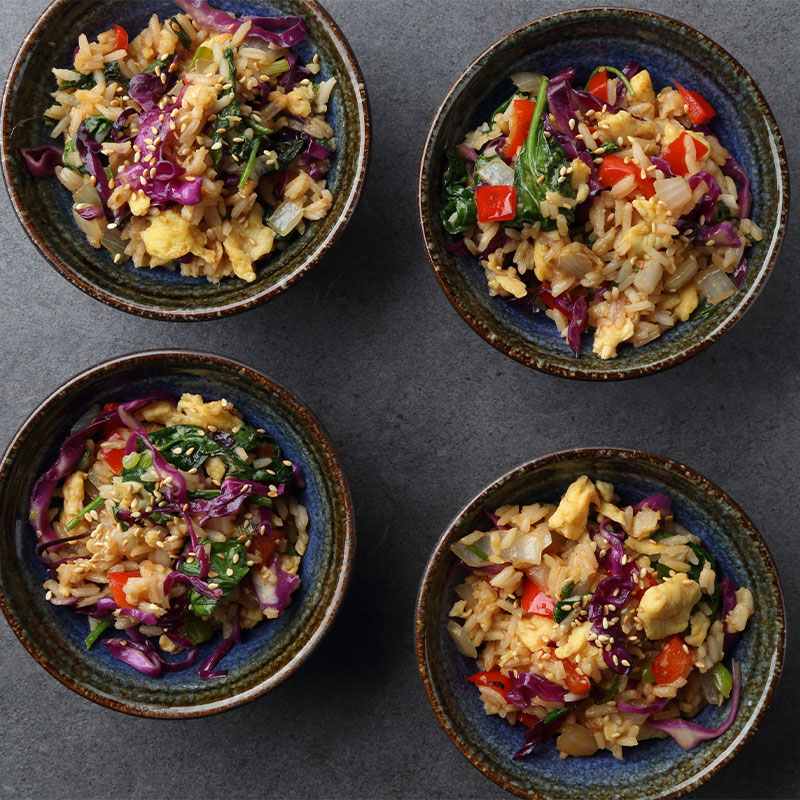 Overhead view of 4 bowls of Red Cabbage & Ginger Fried Rice
