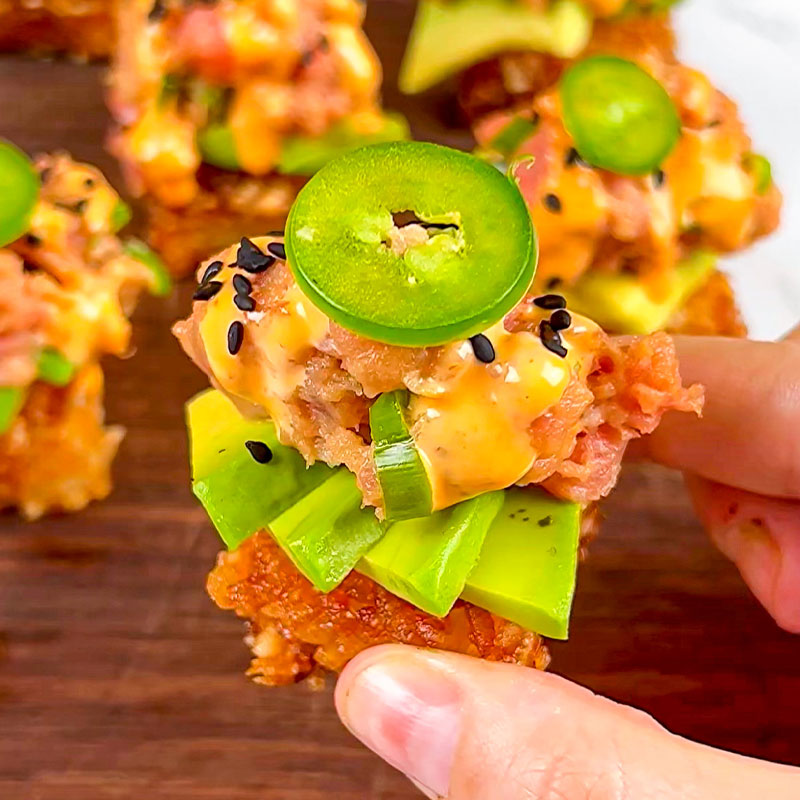 Spicy Tuna Crispy Rice Zoomed in view of a platter of Spicy Tuna Crispy Rice.