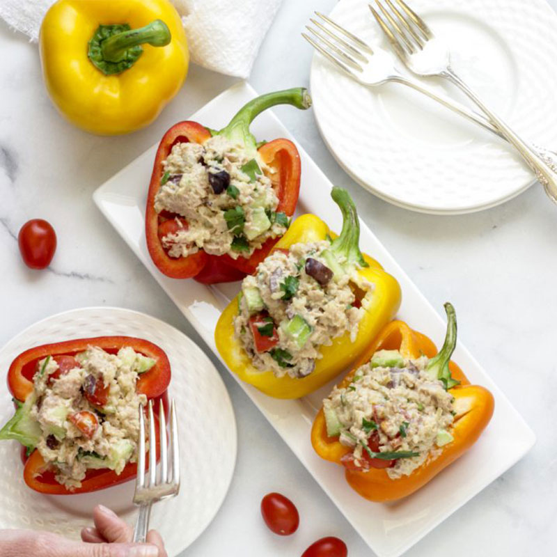 Overhead shot of a platter of Sprouted Brown Rice & Tuna Stuffed Pepper Salad.