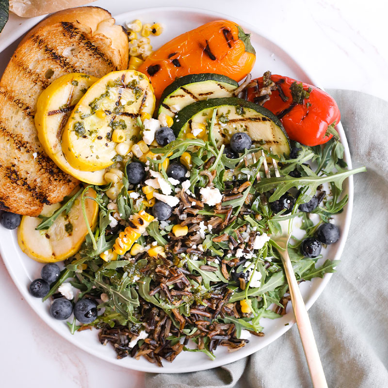 Overhead view of a plate of Summer Wild Rice Salad.