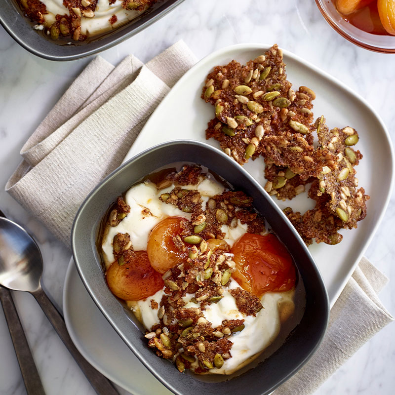 Overhead image of Sweet and Salty Brown Rice Granola on a white plate.