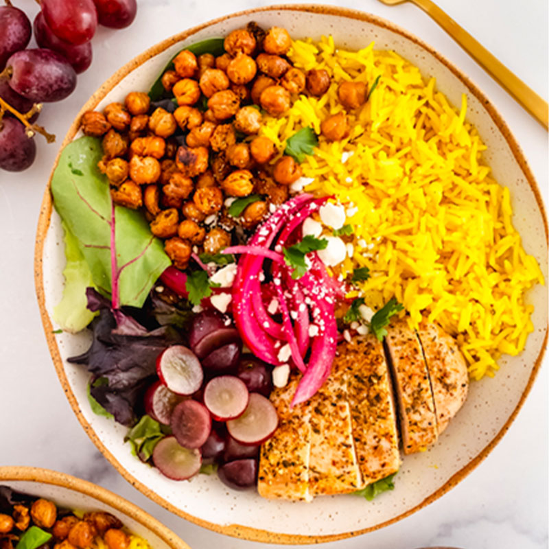 Overhead view of a very colorful Turmeric Coconut Basmati Rice Bowl.