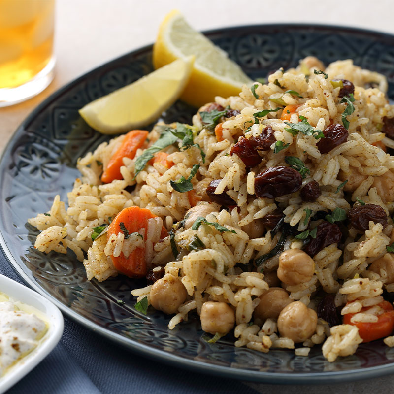 A plate of Za'atar Chickpea Rice with Yogurt Sauce