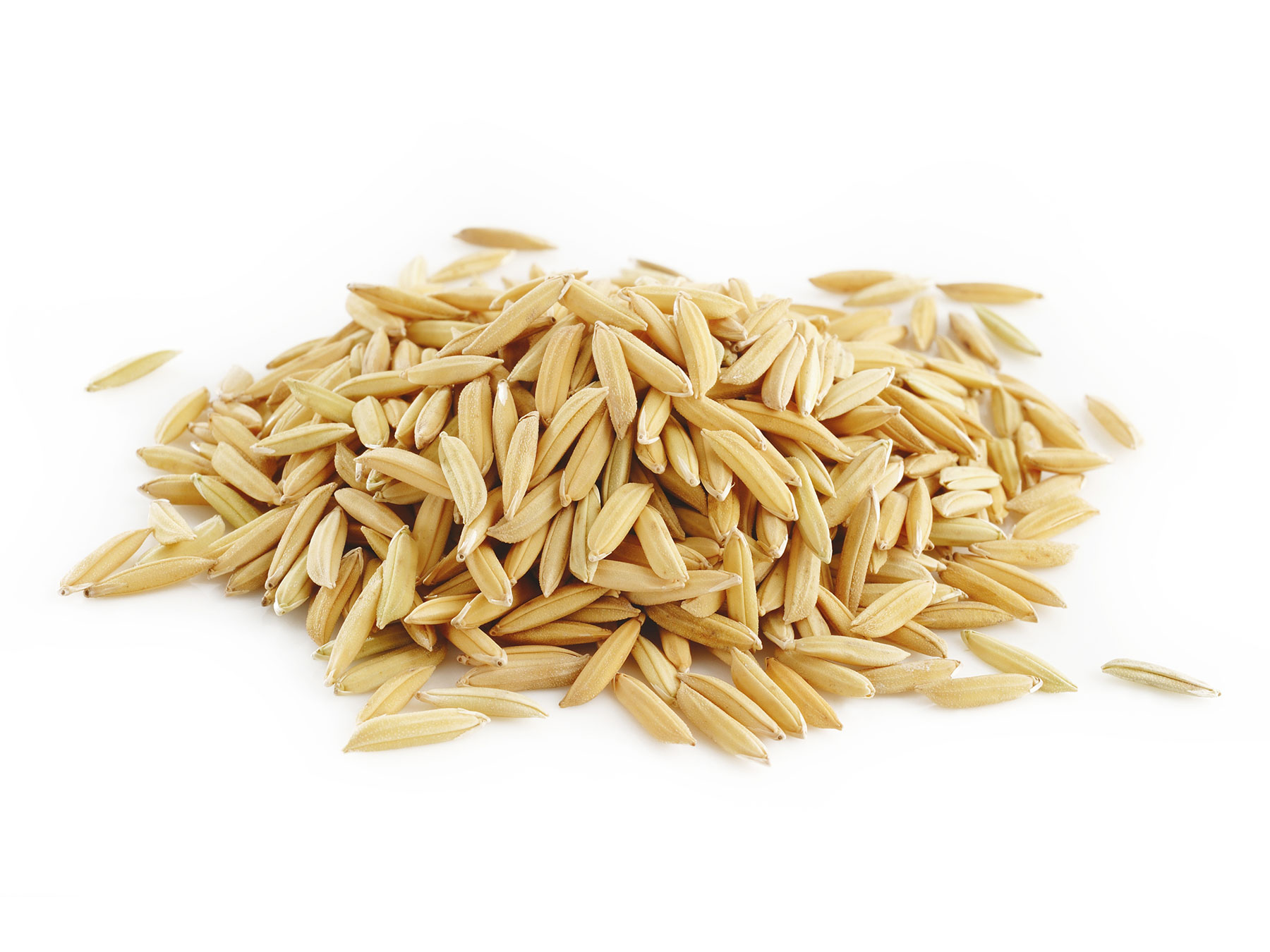 Rough Rice Side view of rough rice grains in a pile.