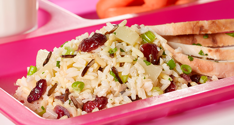 Brown and wild rice salad on a school lunch tray