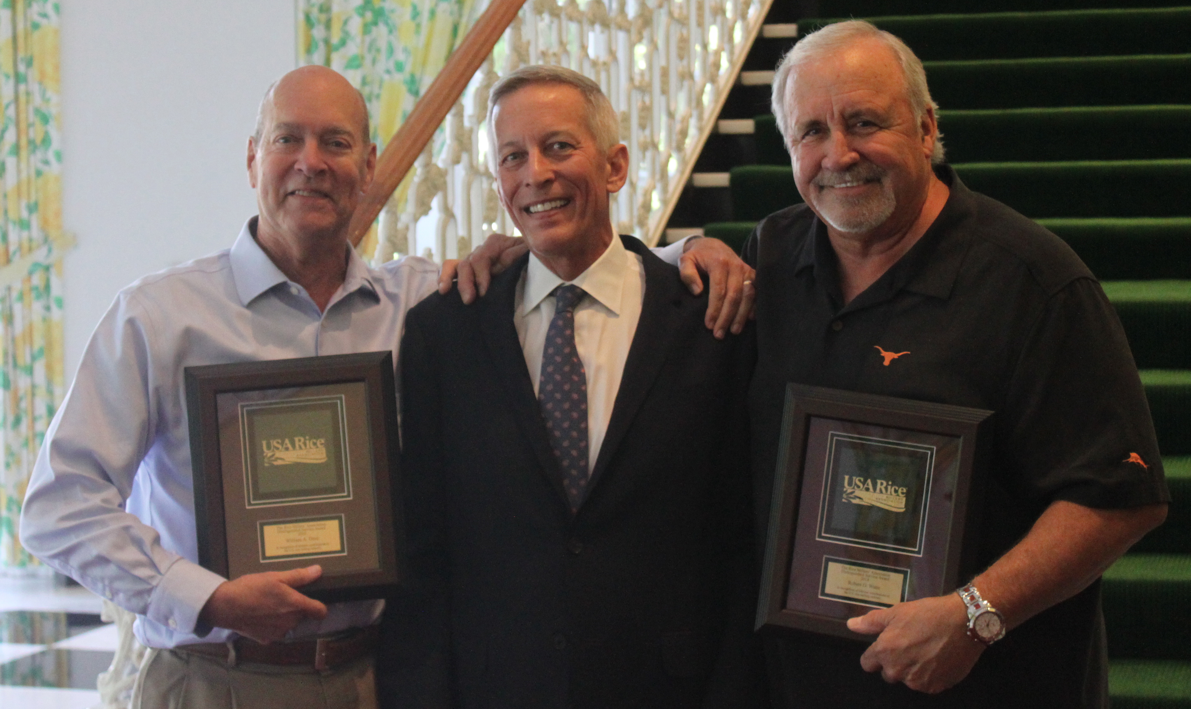 KBX, Inc. President Steven Keith presents Distinguished Service Awards to two RMA members:  Bill Dore (left) and Bob Watts (right)