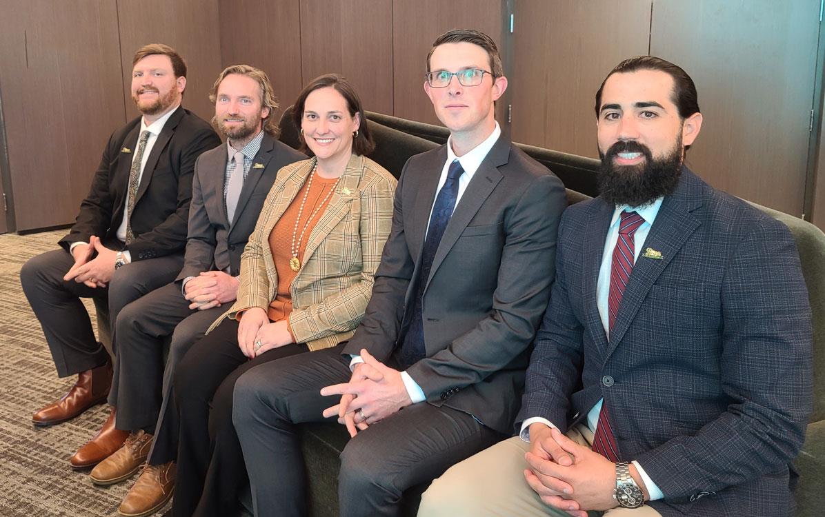 2022-24-Rice-Leadership-Class sits in a row on a couch