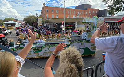 88th IRF, Waving at Queens Float from grand stand