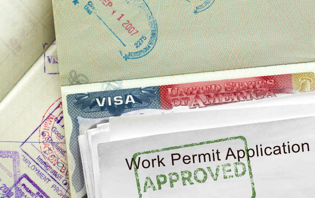 Photo of H2A Worker documents including visa, passports, & work permits