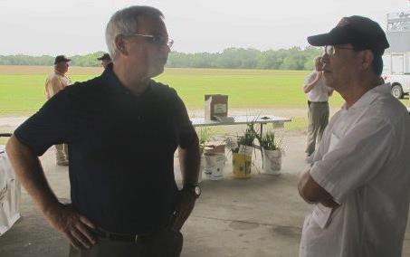 Jim Guinn at 2014 LSU Field Day talking with researcher