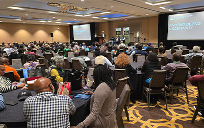 2025 NBGC Annual Mtg crowd seated at tables for presentations