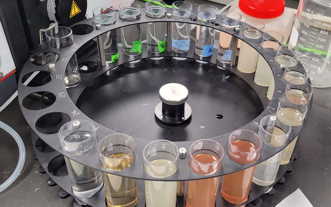 Rice-Malt-Samples, glass vials in circular rack surrounded by beakers and plastic tubing
