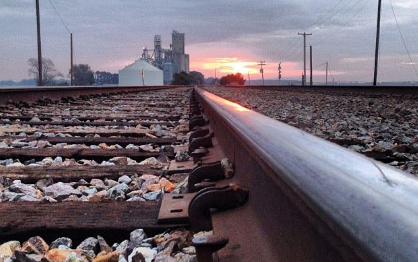 Close-up of rails leading to rice mill, Baker Morgan photo