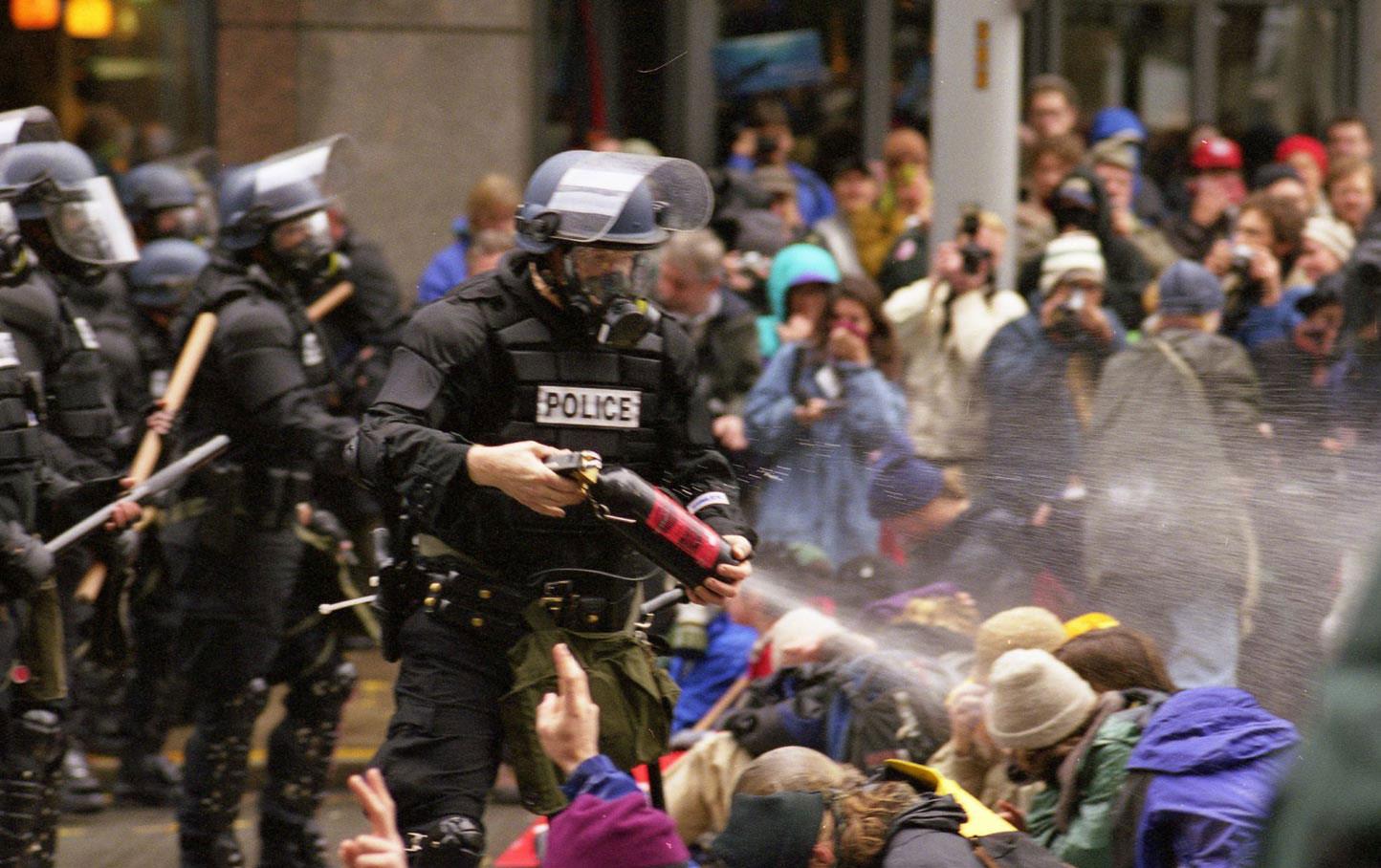 WTO-1999 Battle-of-Seattle, police teargassing protesters