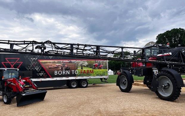 2024-Ag-on-the-Mall,-Born-to-Farm poster hangs from model equipment