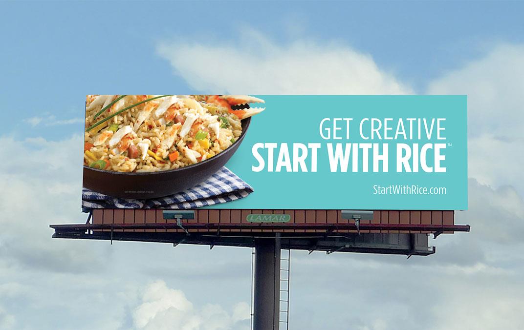 Billboard shows rice dish on blue background with text "Get Creative Start With Rice"