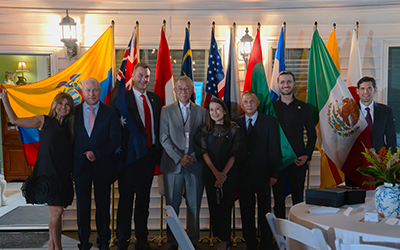 Awardees with flags at Global Friends of Agriculture Awards