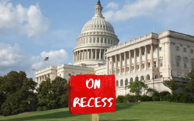 US Capitol with "On Recess" sign posted out front
