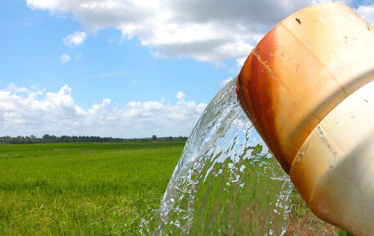 Ground-water flowing from large white pipe, LSU-Photo