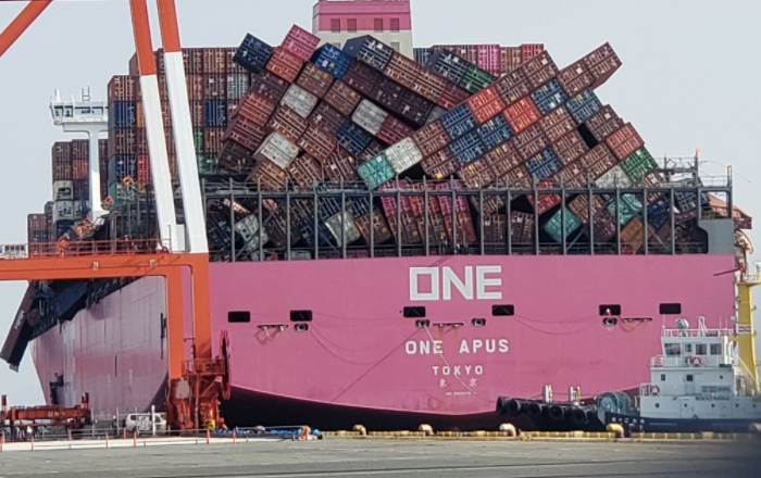 Shipping containers in a jumble aboard a freighter