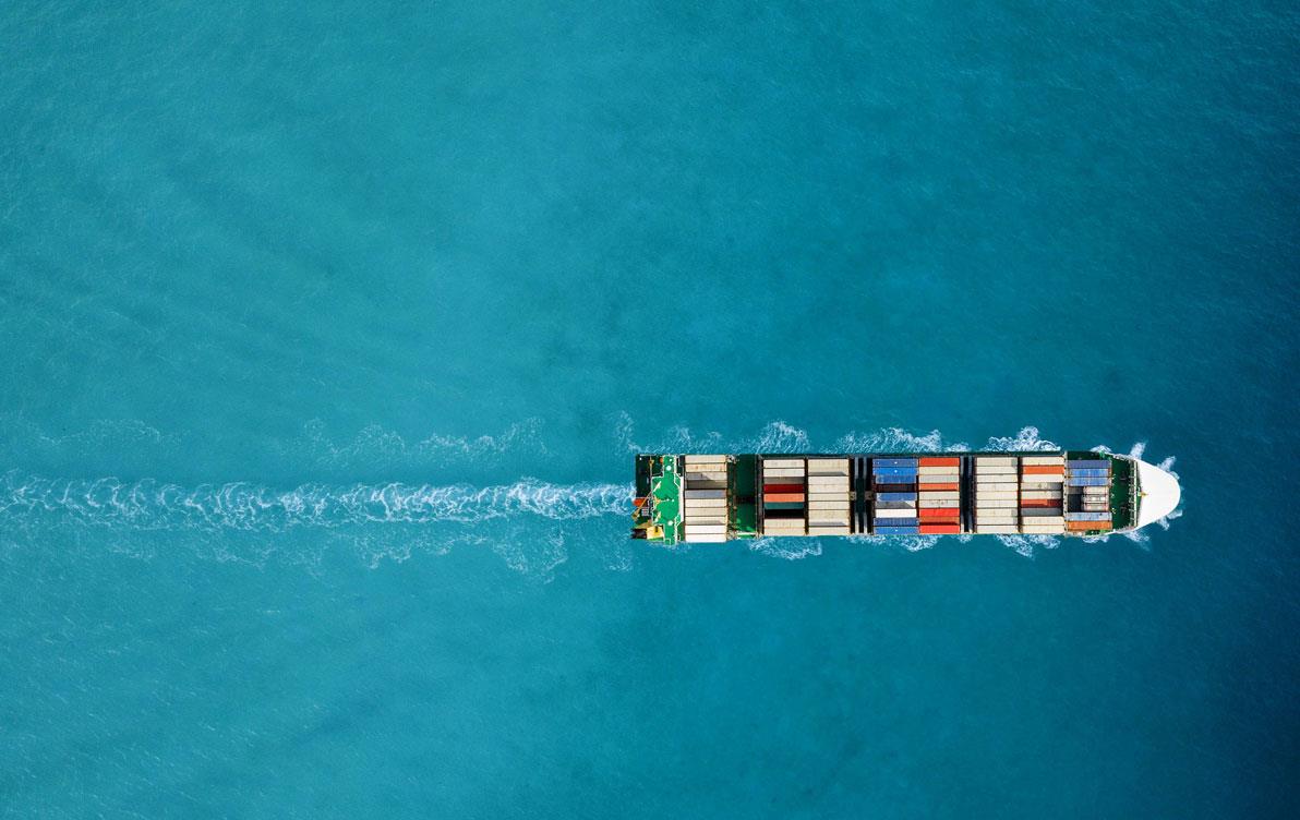 Aerial view of ocean vessel filled with shipping containers
